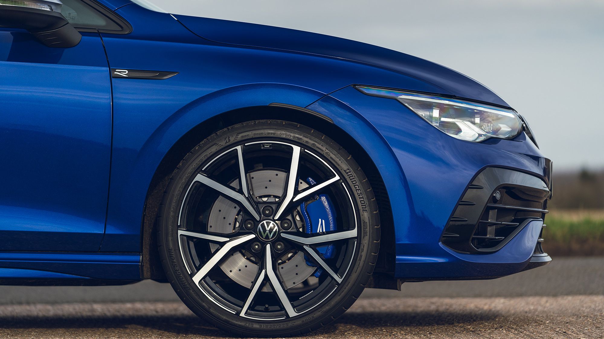 Volkswagen Golf R Front side view of a blue Volkswagen Golf R