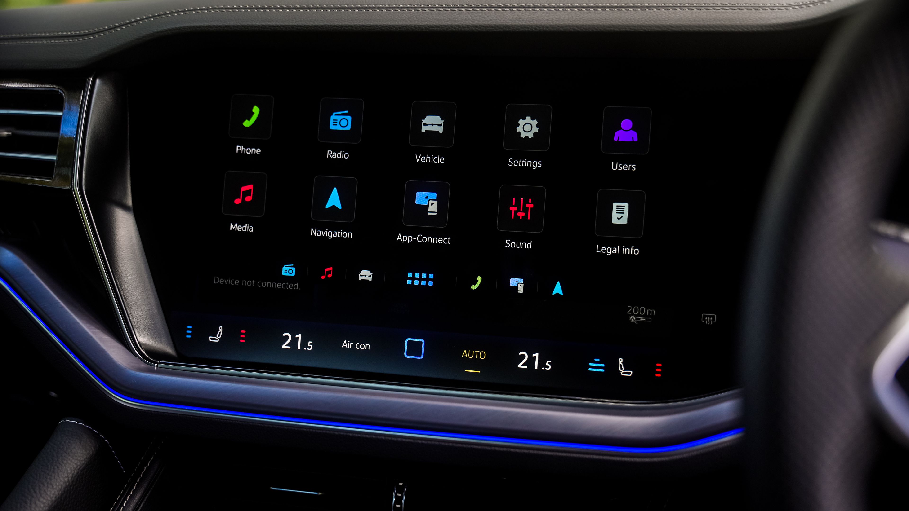 Volkswagen Touareg R-Line | Wireless App-Connect A modern luxury SUV's infotainment touchscreen displaying various functions such as navigation, radio, and climate control.
