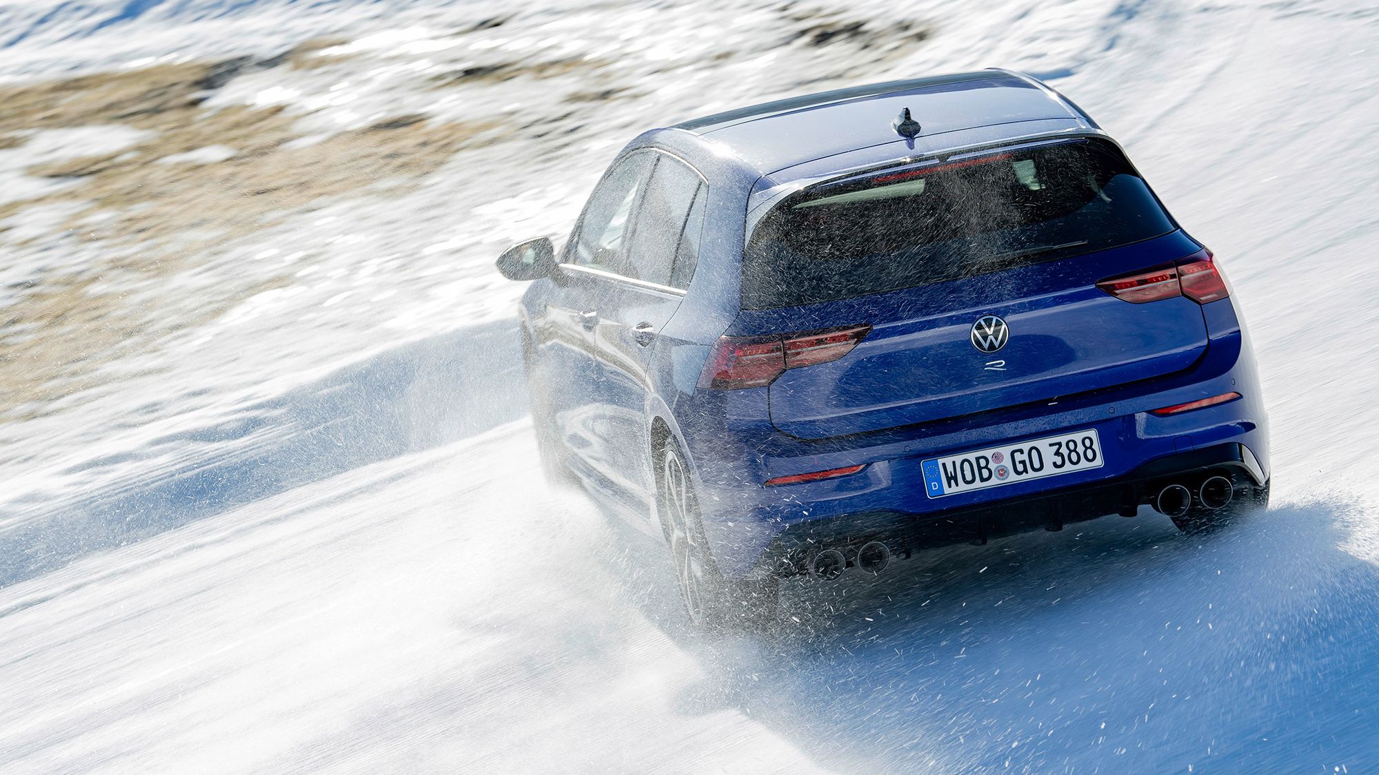 Volkswagen Golf R A blue Volkswagen Golf R drifting